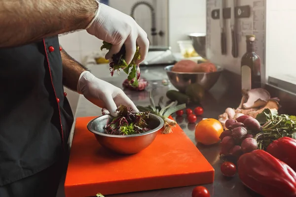 Stock image Chef making fresh vegetables mix salad