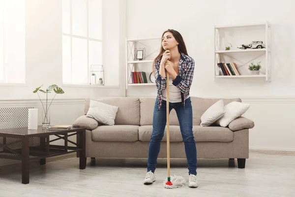 Young woman tired of spring cleaning house — Stock Photo, Image