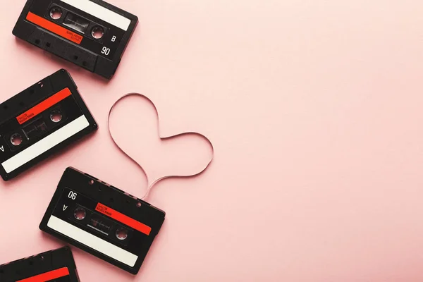 Vintage cassette with magnetic tape in shape of heart