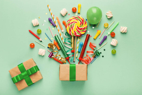 Birthday party background with gift and lollipops