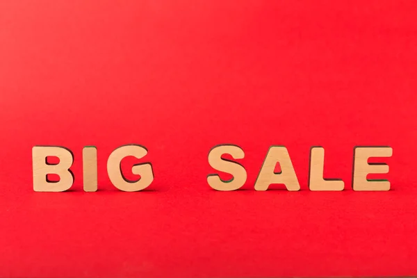 Big sale spelled with wooden letters — Stock Photo, Image