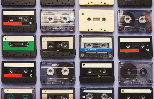 Vintage audio cassettes blue background
