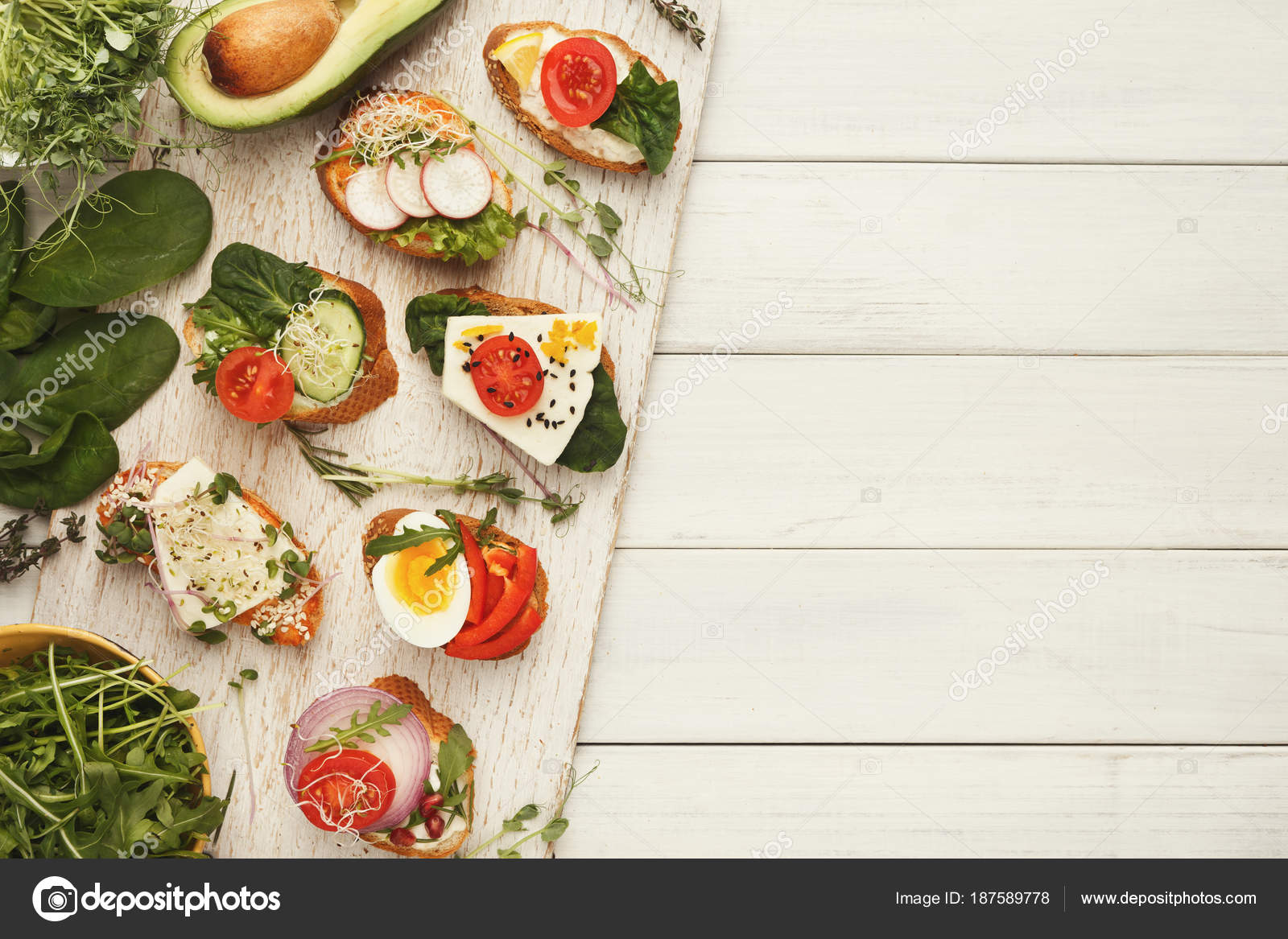 Variety of healthy vegetarian sandwiches — Stock Photo © Milkos #187589778