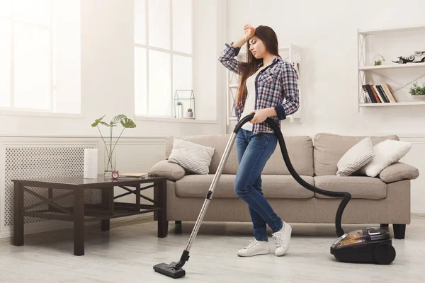 Young woman tired of spring cleaning house — Stock Photo, Image