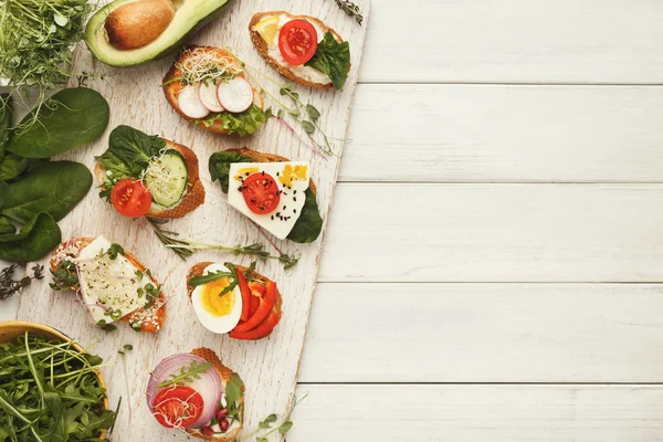 Variety of healthy vegetarian sandwiches — Stock Photo, Image