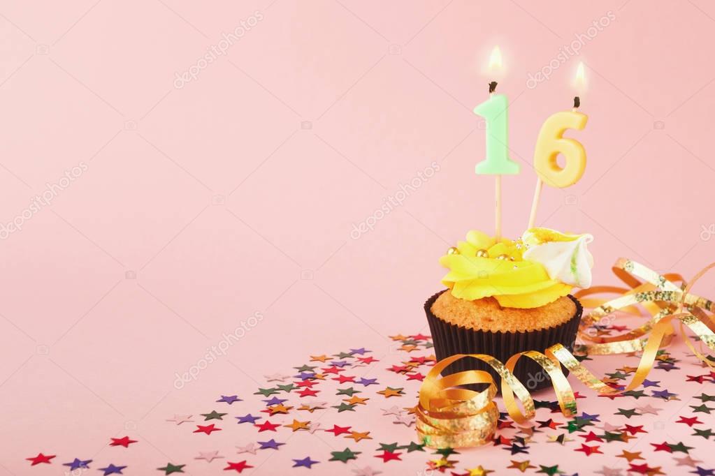 16th birthday cupcake with candle and sprinkles — Stock Photo © Milkos