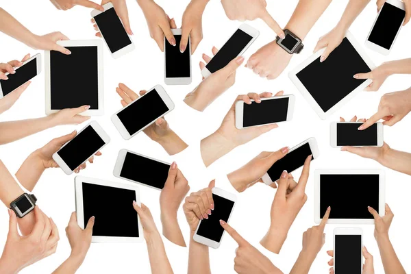 Male and female hands pointing, holding smartphone and tablet — Stock Photo, Image