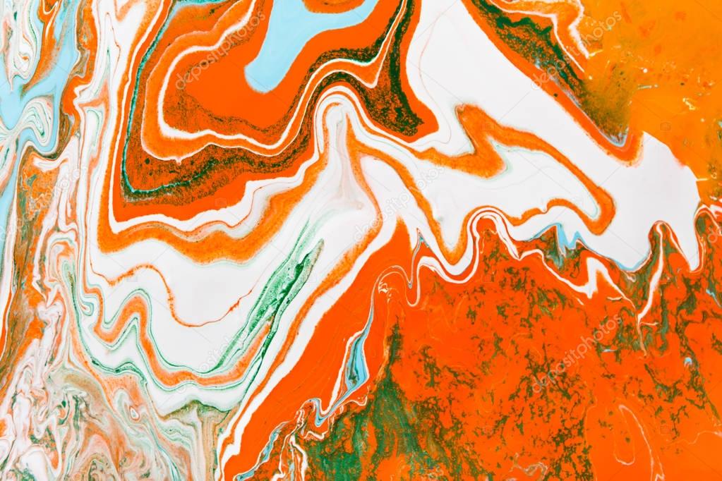 Liquid marbling acrylic paint background. Fluid painting abstract