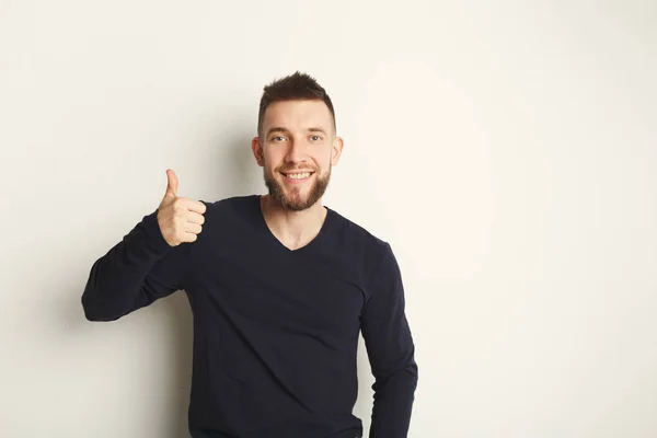 Cheerful man showing like, thumb-up gesture — Stock Photo, Image