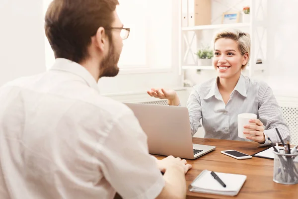 Couple of young business partners working at modern office — Stock Photo, Image