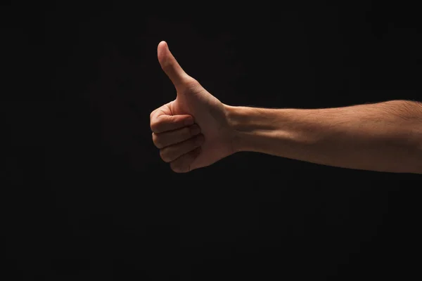 Кавказький чоловік боку зробити великий палець вгору жестом, ізольовані на чорному — стокове фото