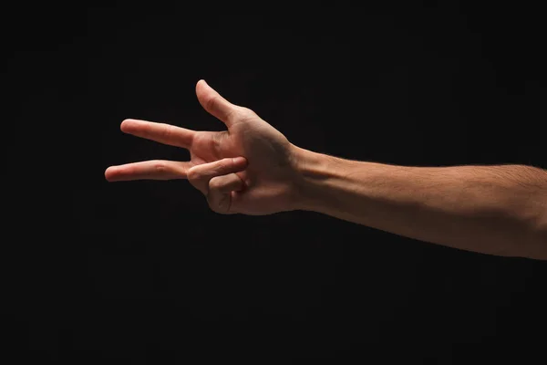 Mão masculina mostra o número três isolado a preto — Fotografia de Stock