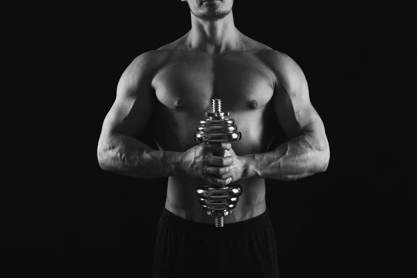 Fuerte atlético hombre con dumbbell muestra desnudo muscular cuerpo — Foto de Stock