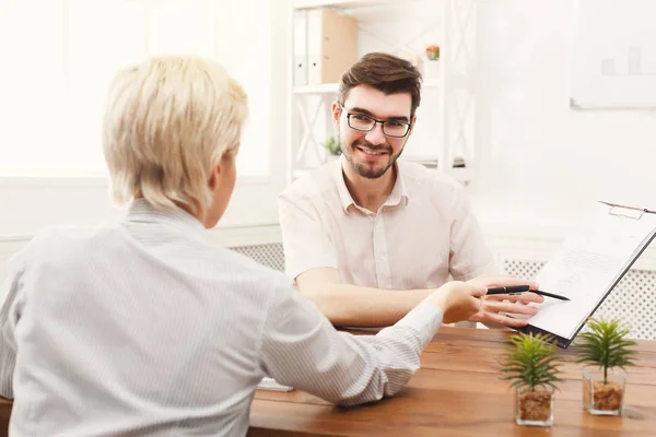 Couple of young colleagues working at modern office — Stock Photo, Image