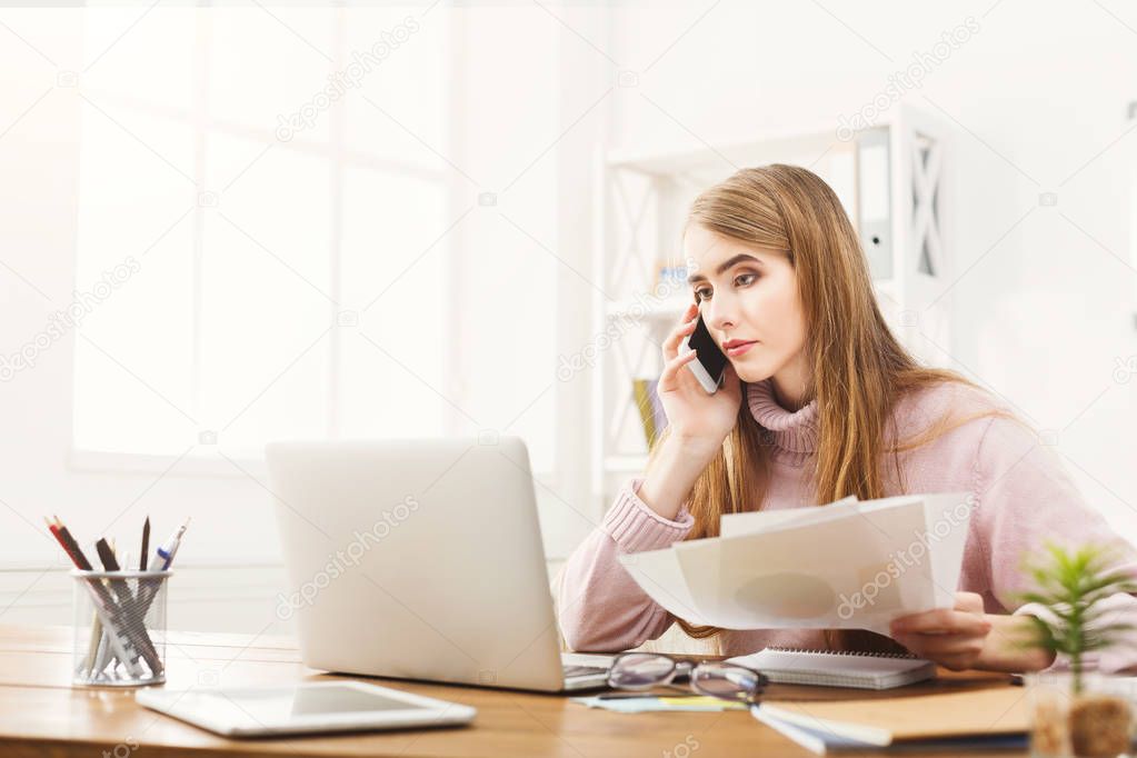 Business talk, woman consulting by phone at office