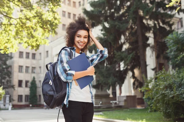 African-american student with books at university — Stock Photo, Image