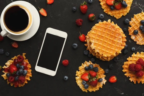 Belgium waffles with berries, tasty breakfast on black background — Stock Photo, Image