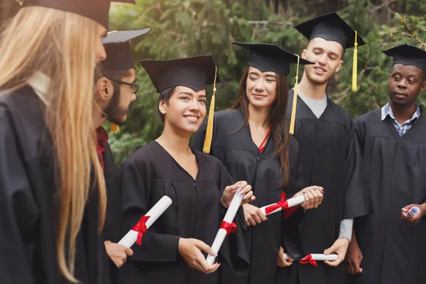 A group of graduates celebrating — Stock Photo, Image