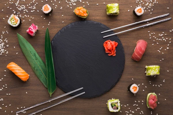 Set of sushi, maki, gunkans and rolls. Asian cuisine