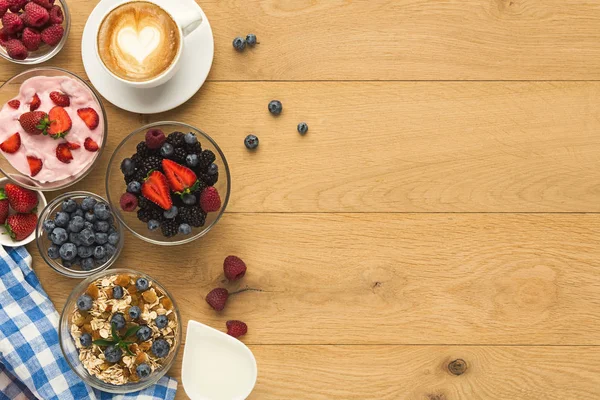 Rich breakfast on natural wooden table — Stock Photo, Image