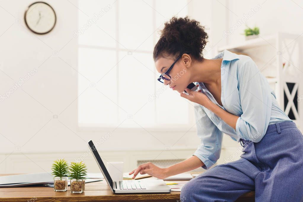 Concentrated business woman talking on phone