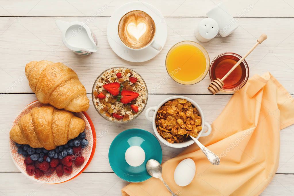 Continental breakfast menu on woden table