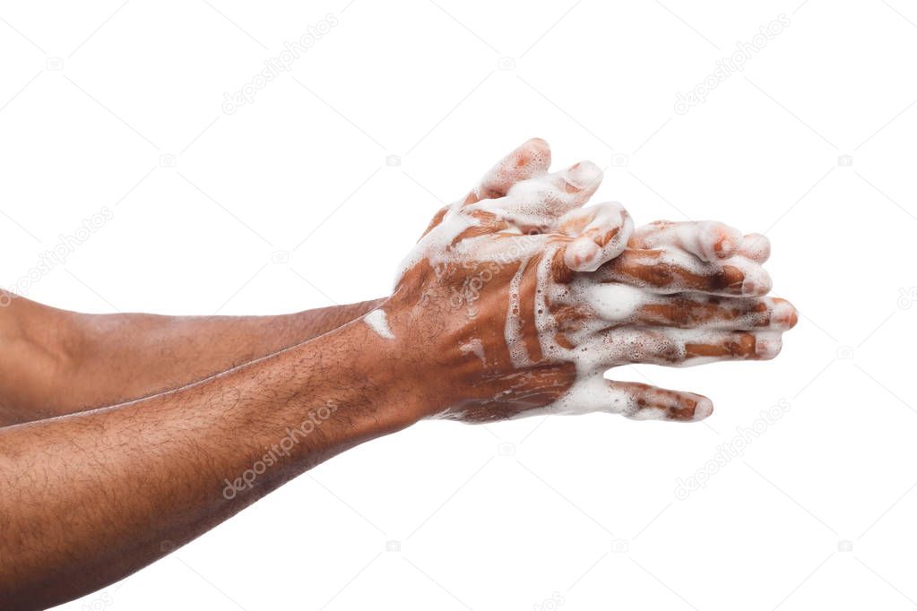 Black man washing hands isolated on white background