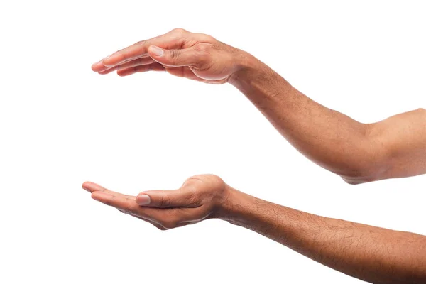 Zwarte mannelijke handen houden iets, knipsel — Stockfoto