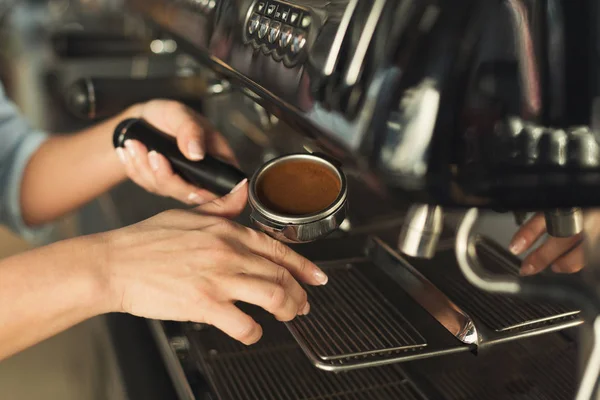 Closeup of barmen hand brewing espresso in professional coffee machine — Stock Photo, Image