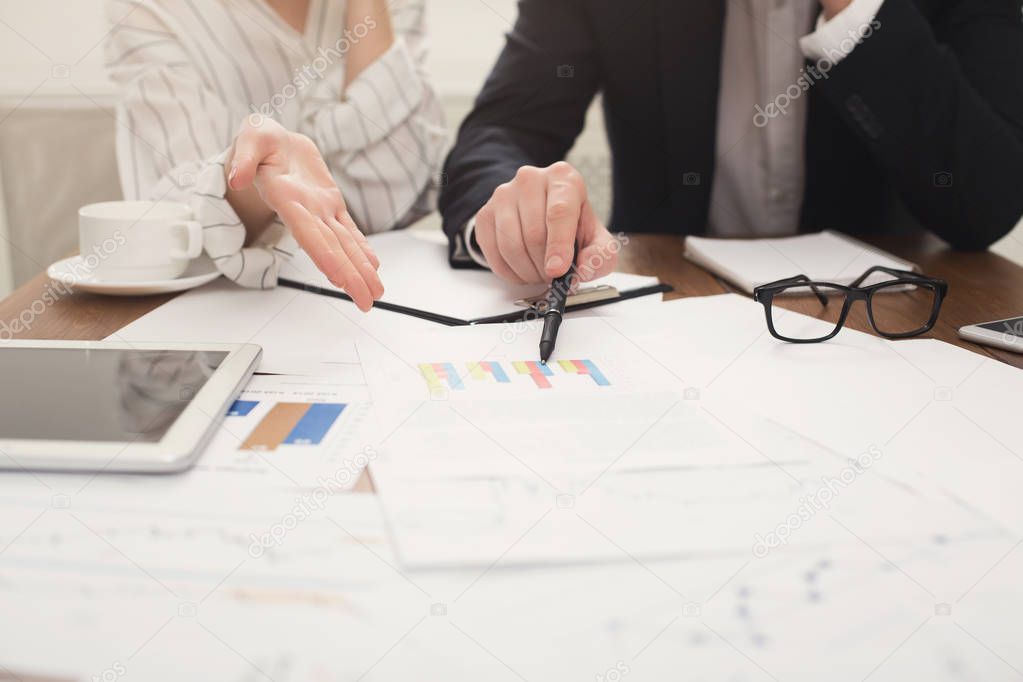 Business colleagues working with documents