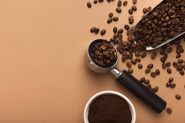 Coffee machine holder with ground roasted beans — Stock Photo, Image