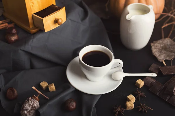 Coffee cup and sweets on vintage wooden table — Stock Photo, Image