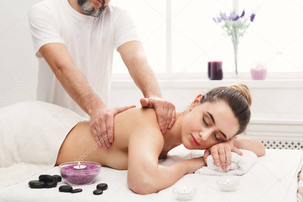 Classical body massage at spa salon