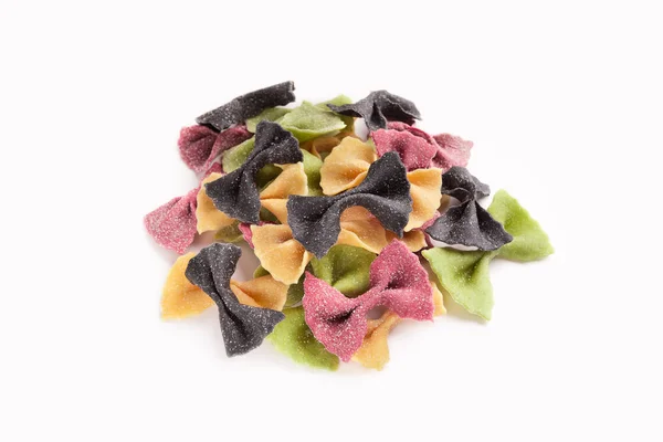 Heap of colorful farfalle pasta isolated on white — Stock Photo, Image