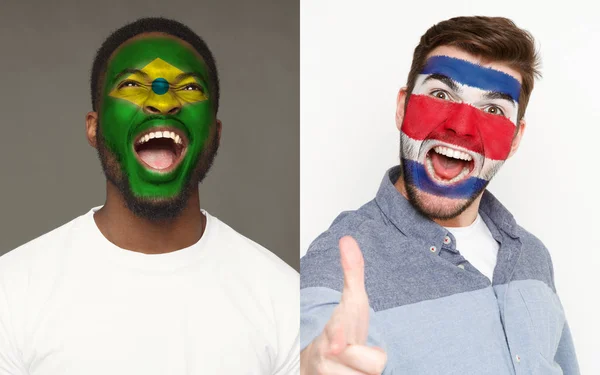 Känslomässiga fotbollsfans med målat flaggor på ansikten — Stockfoto