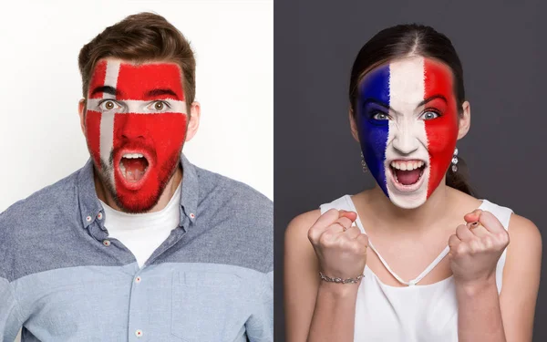 Aficionados emocionales al fútbol con banderas pintadas en las caras — Foto de Stock