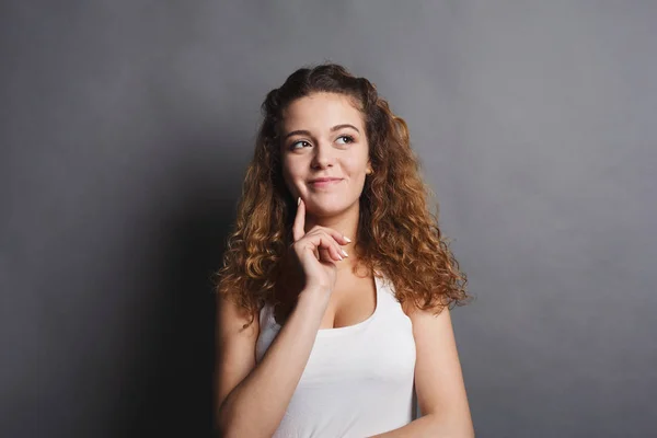 Portrait of thoughtful woman with mysterious look — Stock Photo, Image