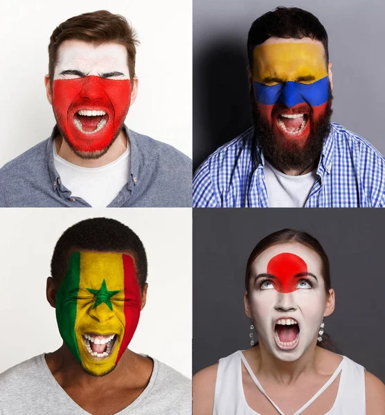 Duygusal futbol taraftarları yüzleri boyalı bayraklı — Stok fotoğraf