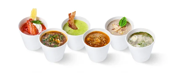 Verschiedene Suppen im Restaurant, isoliert auf weiß — Stockfoto