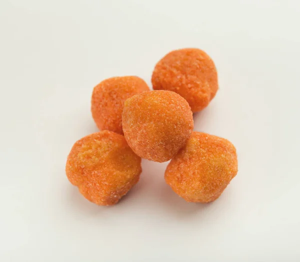 Round orange chocolate candies isolated on white — Stock Photo, Image