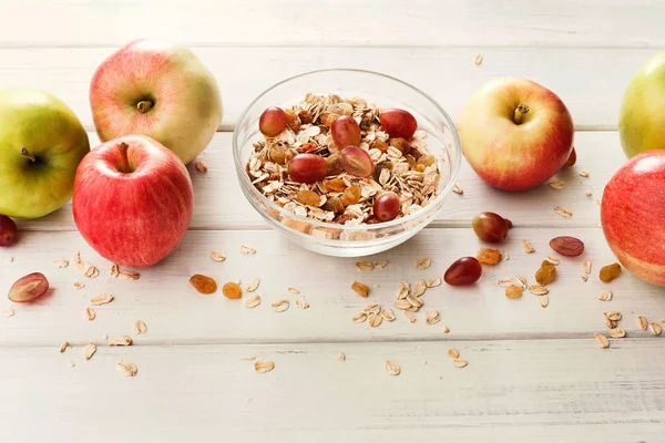 Healthy morning meals with muesli and apples