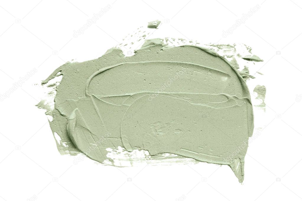 Blue clay facial mask smear on white isolated background