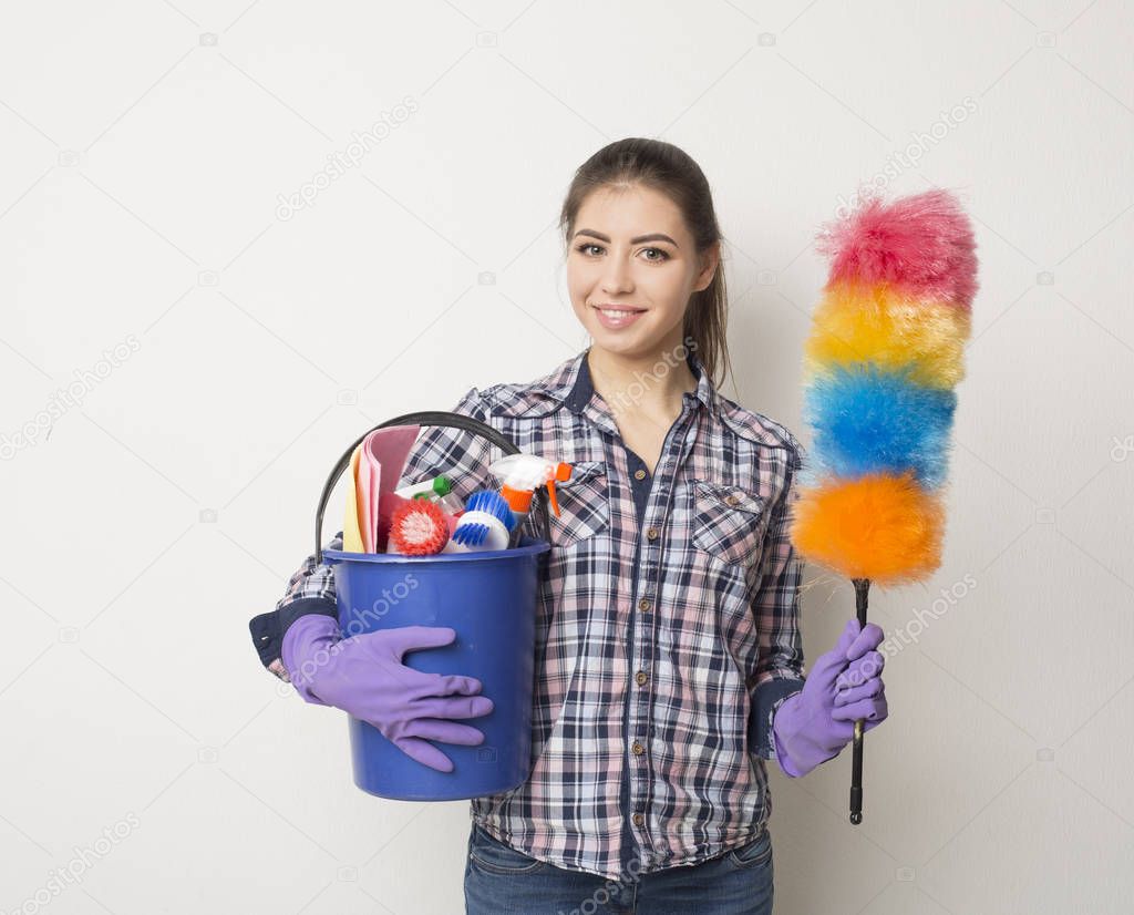 Cleaning service woman presenting a blank board