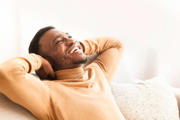 Happy Black Guy Relaxing Sitting On Couch At Home — Stock Photo, Image