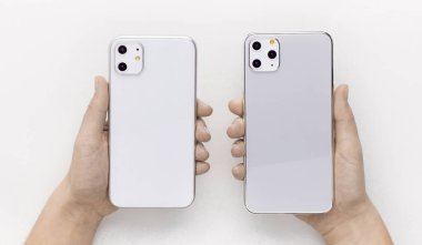 Comparison of two new models of IPhone 11 in hands