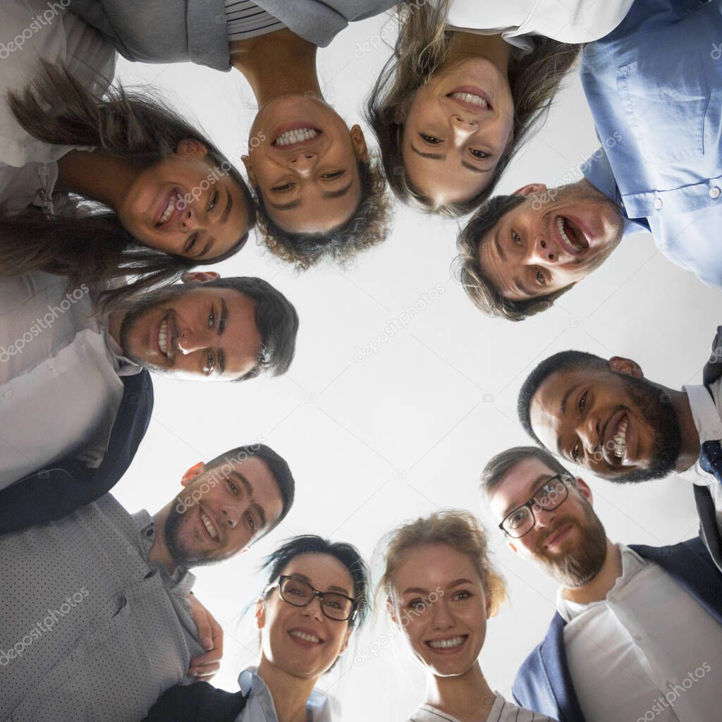 Happy diverse business people standing in circle