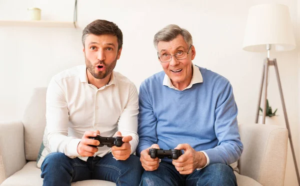 Best Elderly Video Gaming Royalty-Free Images, Stock Photos & Pictures