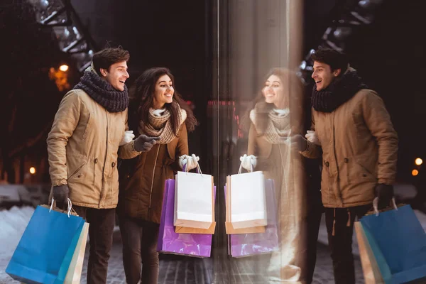 Spouses Looking At Shopwindow Shopping In Night City In Winter — Stock Photo, Image