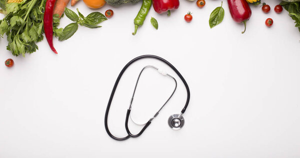 Stethoscope and vegetables for saving healthy in winter