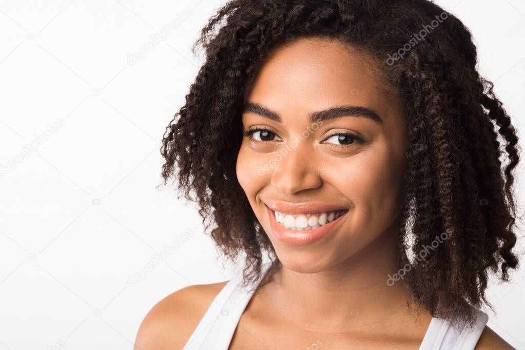 Close-up of beautiful black girl looking at camera